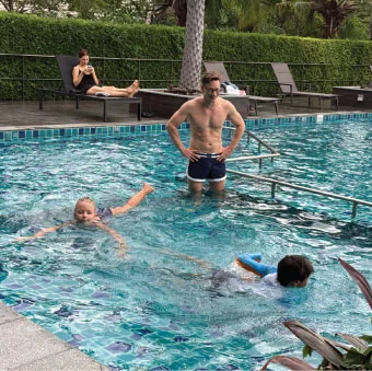 Outdoor swimming pool with kids pool at Herma Hotel